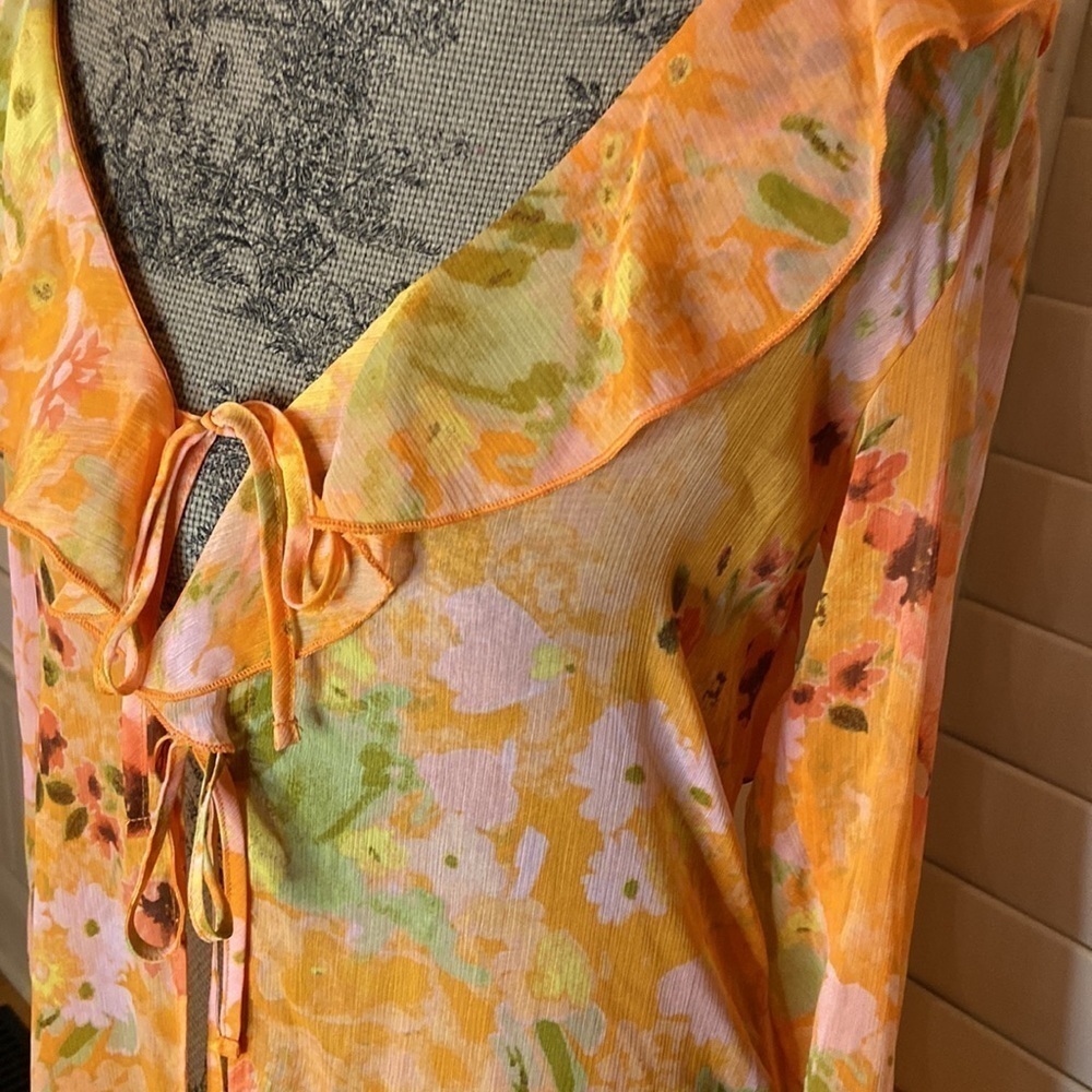 Women's Ruffle Duster Jacket - Wild
Fable Orange Floral - Picture 8 of 10
